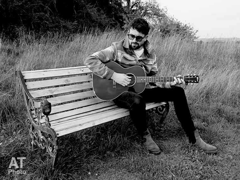 Alex Grosart, singer song writer by Ant Tyler, Copyright 2025.